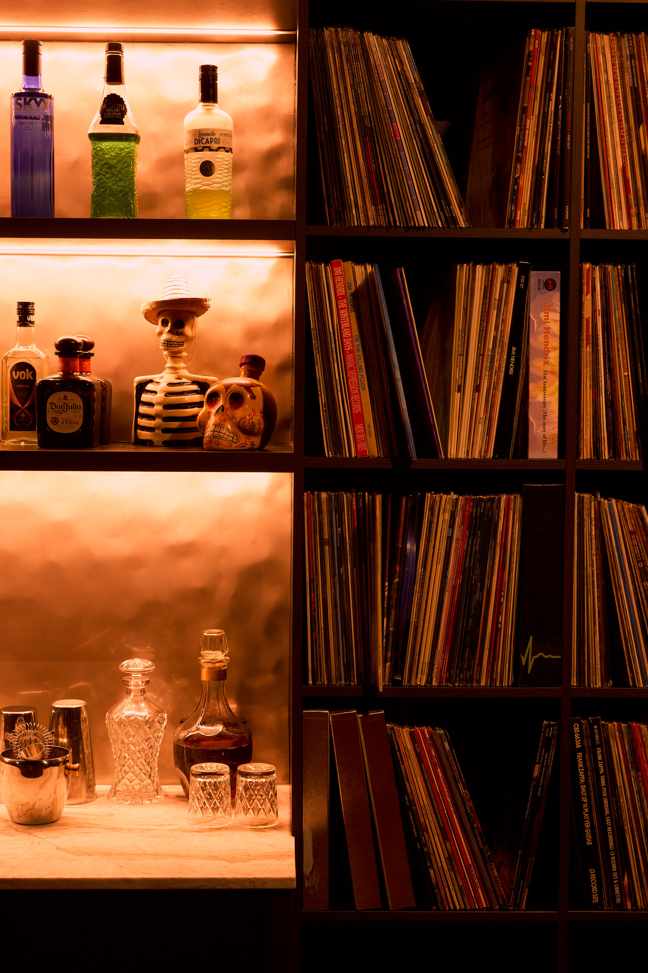 Palme Hus, record collection and bar shelving, lit from within