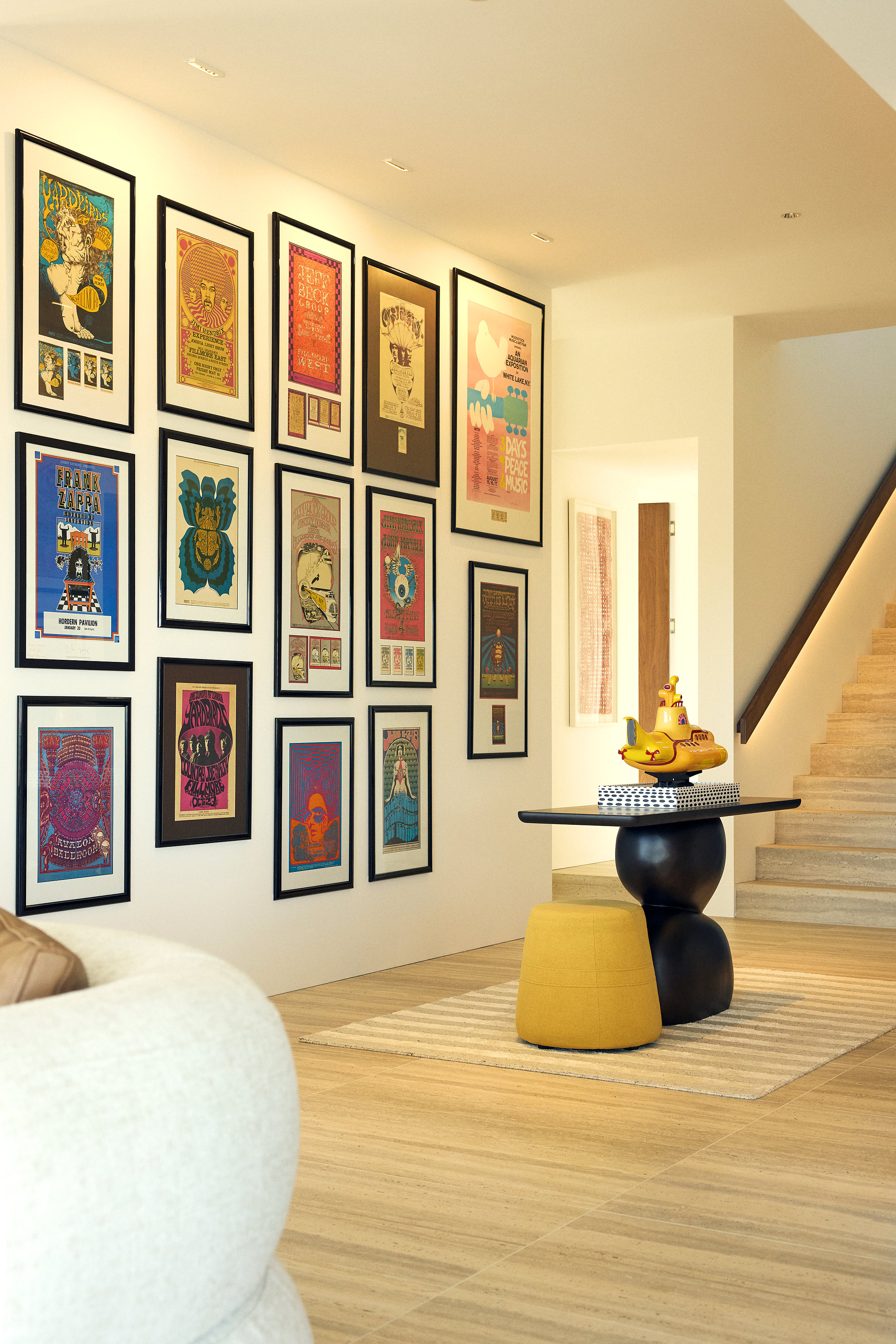 Palme Hus, gallery wall of framed posters along the hall